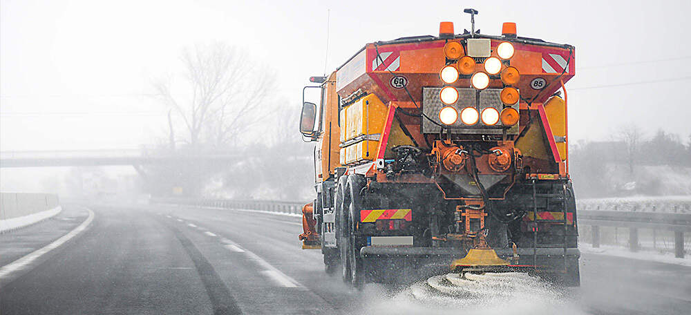Snow plow on a road